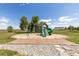 Home featuring a playground with a slide, swings, and a sandbox for outdoor entertainment at 2370 W 152Nd Ave, Broomfield, CO 80023
