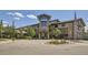 Exterior view of building with stone accents and well-maintained landscaping at 3124 S Wheeling Way # 102, Aurora, CO 80014