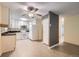 Well-lit kitchen featuring a breakfast bar, modern appliances, and ample cabinet space at 3124 S Wheeling Way # 102, Aurora, CO 80014