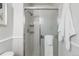 Clean bathroom features a glass shower stall and modern fixtures at 6288 S Harlan Way, Littleton, CO 80123