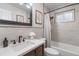 Bathroom featuring upgraded vanity, decorative mirror and hardware, paint, and tub at 6288 S Harlan Way, Littleton, CO 80123