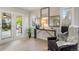 Sitting area with French doors leading to patio at 6288 S Harlan Way, Littleton, CO 80123