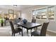 Dining room with large windows and modern decor at 6288 S Harlan Way, Littleton, CO 80123