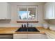 Kitchen window and butcher block countertops at 6288 S Harlan Way, Littleton, CO 80123