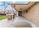 Enjoy the covered outdoor kitchen with stone accents at 6288 S Harlan Way, Littleton, CO 80123