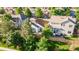 Residential single Gathering home with fenced in back yard nestled in a neighborhood with mature trees and manicured lawns at 10581 Pearlwood Cir, Highlands Ranch, CO 80126