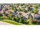 Residential single Gathering home with fenced in back yard nestled in a neighborhood with mature trees and manicured lawns at 10581 Pearlwood Cir, Highlands Ranch, CO 80126