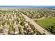 Stunning aerial view of a residential community with organized streets and open fields in the distance at 10581 Pearlwood Cir, Highlands Ranch, CO 80126