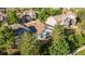 Residential single Gathering home nestled in a neighborhood with mature trees and manicured lawns at 10581 Pearlwood Cir, Highlands Ranch, CO 80126