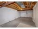 Unfinished basement shows exposed beams and utilities offer a blank canvas for customization and storage at 10581 Pearlwood Cir, Highlands Ranch, CO 80126