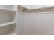 Well-organized walk-in closet with ample shelving and hanging space at 10581 Pearlwood Cir, Highlands Ranch, CO 80126