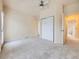 Bedroom with a ceiling fan, closet and bright windows at 3155 E 104Th Ave # 4E, Thornton, CO 80233
