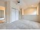 Bedroom featuring neutral colors, a ceiling fan, a closet, and bright windows for lots of light at 3155 E 104Th Ave # 4E, Thornton, CO 80233