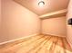This bedroom features sleek hardwood floors, recessed lighting, and neutral walls at 3155 E 104Th Ave # 4E, Thornton, CO 80233