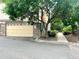 Attached garage with brick accents and a well-manicured landscaped exterior at 3155 E 104Th Ave # 4E, Thornton, CO 80233