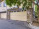 Multi-car garage featuring stone accents and clean lines at 3155 E 104Th Ave # 4E, Thornton, CO 80233