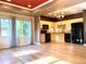Modern kitchen area with light cabinetry, black appliances, and hardwood floors at 3155 E 104Th Ave # 4E, Thornton, CO 80233