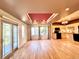 Open concept living room and kitchen area with sleek appliances and balcony access at 3155 E 104Th Ave # 4E, Thornton, CO 80233