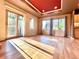 Spacious living room with hardwood floors, natural lighting, and direct balcony access at 3155 E 104Th Ave # 4E, Thornton, CO 80233
