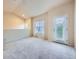 Loft with large window and door allowing lots of natural light to flow throughout the space at 3155 E 104Th Ave # 4E, Thornton, CO 80233