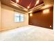 Large main bedroom featuring neutral carpet, accent wall, and natural lighting at 3155 E 104Th Ave # 4E, Thornton, CO 80233