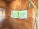 Tiled shower enclosure with window, offering a refreshing space with natural light and a modern showerhead at 3155 E 104Th Ave # 4E, Thornton, CO 80233