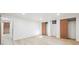 Finished basement with closets and a view to the staircase at 725 S Harrison St, Denver, CO 80209