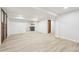 Spacious finished basement with vinyl flooring and wood doors at 725 S Harrison St, Denver, CO 80209