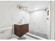 Basement bathroom with marble shower and modern vanity at 725 S Harrison St, Denver, CO 80209