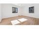 Bright bedroom with wood floors and ceiling fan at 725 S Harrison St, Denver, CO 80209