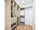 Large walk-in closet with ample shelving and hanging space at 725 S Harrison St, Denver, CO 80209