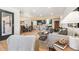 Bright living room with hardwood floors, modern furniture, and a large window at 725 S Harrison St, Denver, CO 80209