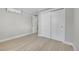 Bedroom featuring neutral paint colors, wood floors, and closet at 1578 N Meade N St, Denver, CO 80204