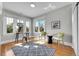 Bright room with large windows and hardwood floors, with stylish decor at 1578 N Meade N St, Denver, CO 80204