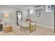 Bright dining area with modern table, seating, and plenty of natural light at 1578 N Meade N St, Denver, CO 80204