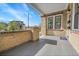 Cozy front porch with brick accents, providing a welcoming entrance at 1578 N Meade N St, Denver, CO 80204