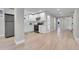 Spacious kitchen with white cabinets, stainless steel appliances, and tiled flooring at 1578 N Meade N St, Denver, CO 80204