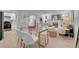 Combined dining and living area featuring modern furniture and stylish decor at 1578 N Meade N St, Denver, CO 80204