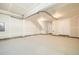 Unfinished basement featuring concrete floors and stairs ready to be customized for your needs at 641 Skyhook St, Erie, CO 80516