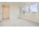 Spacious bedroom featuring hardwood floors and updated windows providing ample natural light at 641 Skyhook St, Erie, CO 80516