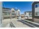 Beautiful townhomes on a private street with a view of a neighborhood at 641 Skyhook St, Erie, CO 80516