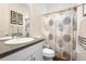 Bathroom with a shower and tub combination, vanity, mirror and modern decor at 2027 Vallejo Loop, Broomfield, CO 80023