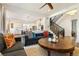 Comfortable living room with an open floor plan, seamlessly flowing into the modern kitchen at 2027 Vallejo Loop, Broomfield, CO 80023
