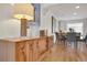 Elegant dining room featuring a mid-century modern buffet and an adjacent seating area at 32 Skyline Dr, Wheat Ridge, CO 80215