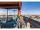 Outdoor balcony with seating and stunning city views at 100 Park W Ave # 1403, Denver, CO 80205