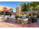 Outdoor fire pit area with cozy seating, perfect for enjoying evenings in a serene and landscaped setting at 100 Park W Ave # 1403, Denver, CO 80205
