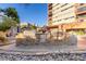 Outdoor grilling area featuring built-in brick facade, stainless steel grills and convenient preparation space at 100 Park W Ave # 1403, Denver, CO 80205