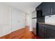 Kitchen area with stainless steel appliances, good storage and hardwood floors at 100 Park W Ave # 1403, Denver, CO 80205