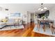 Inviting open-concept living space with hardwood floors, modern lighting, and a stylish kitchen at 100 Park W Ave # 1403, Denver, CO 80205
