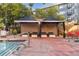 Relaxing poolside lounge area featuring comfortable seating and shaded cabanas for ultimate relaxation at 100 Park W Ave # 1403, Denver, CO 80205